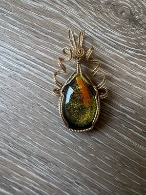 Teardrop shape dichroic glass pendant with wire wrap detail